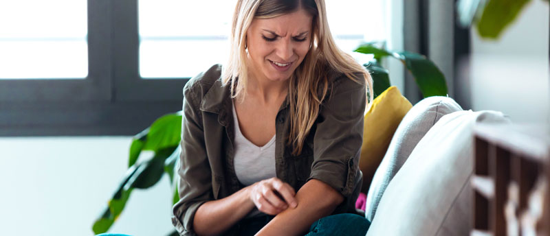 woman itching bee sting that has gotten worse each time