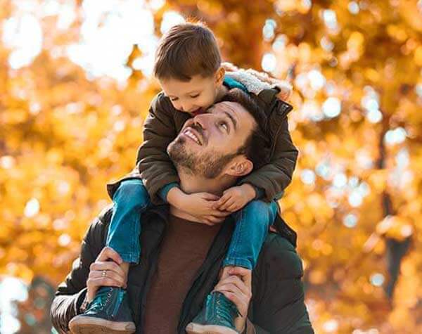 Father and son enjoying fall